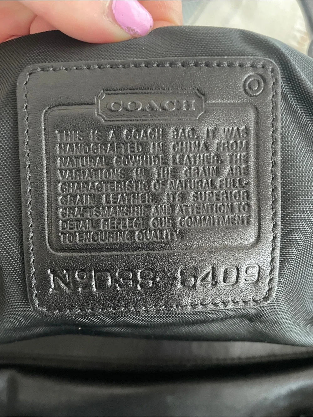 COACH Black Leather Men’s duffel bag - Embossed Logo Patch
